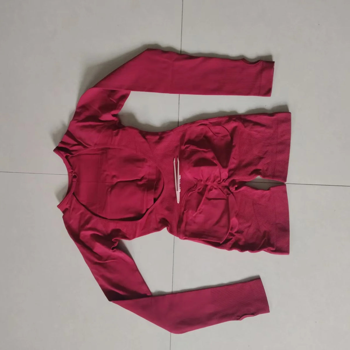 **Women’s Seamless Backless Long-Sleeve Sports Jumpsuit**